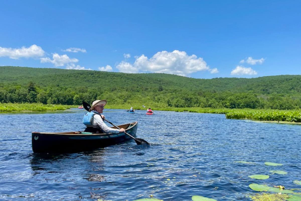 Person canoeing