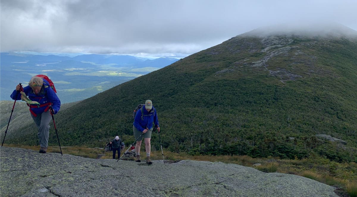 Hikers on a cliff